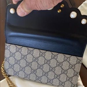 Gucci wallet on a chain